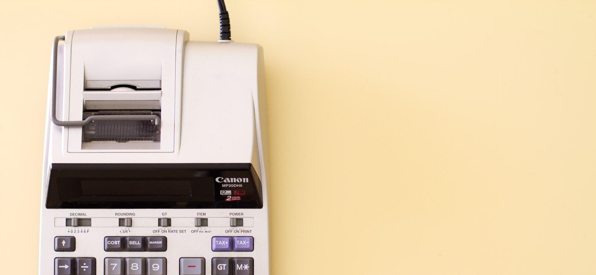 white Canon cash register